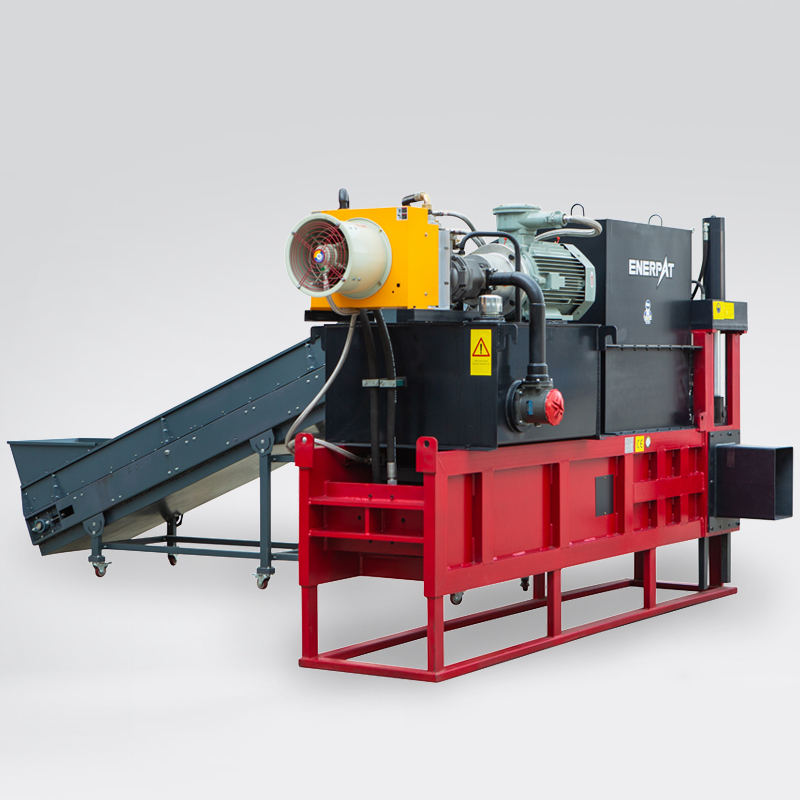Automated bagging press machine in a production line facility